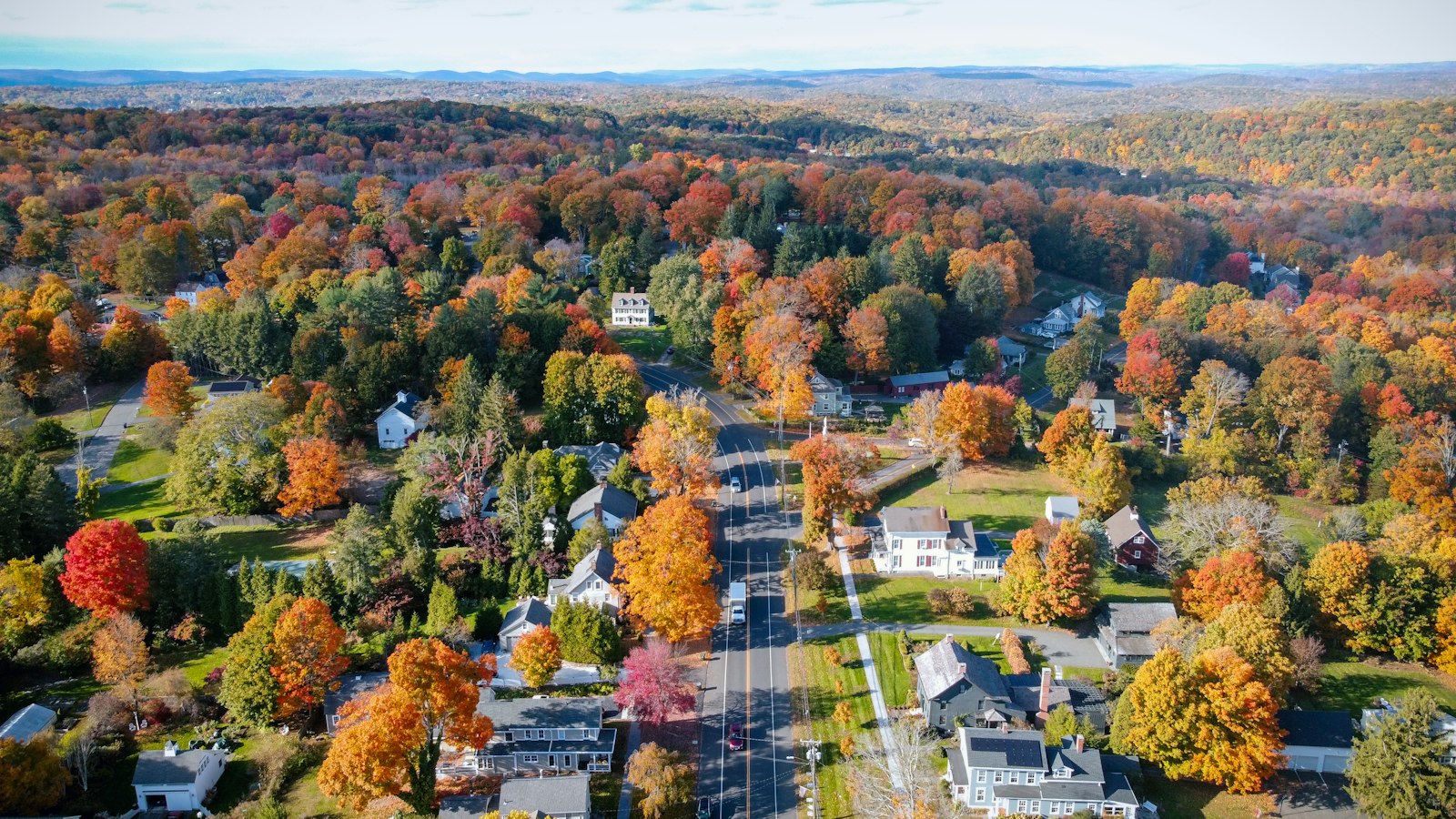 A New England town in peak autumn foliage